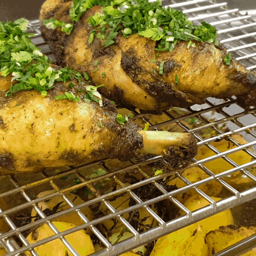 Baked chicken leg with baby potatoes