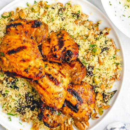 Image of Grilled Moroccan Chicken Thighs with Pecan Couscous