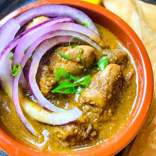 Chicken livers with onion and tomato.