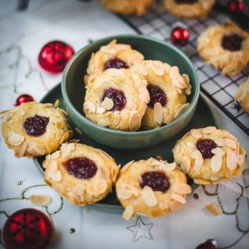 Raspberry Thumbprint Cookies with Almond Slices and Ground Hazelnut