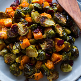 Image of Roasted Brussels Sprouts and Squash with Dried Cranberries and Dijon Vinaigrette