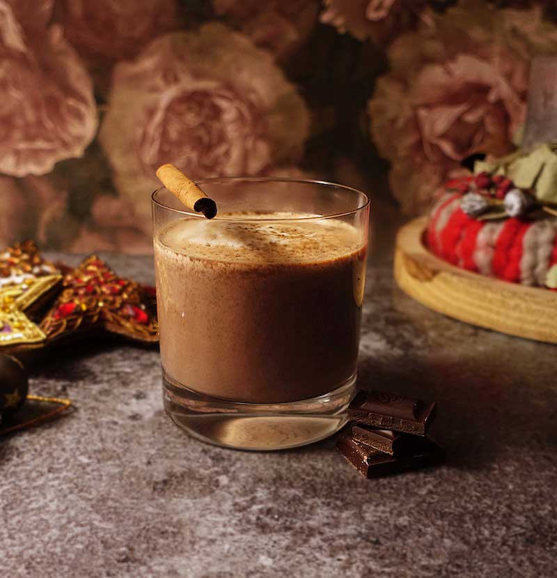 Hot Christmas Mezcal cocktail with chocolate