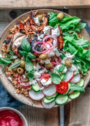 Mediterranean grain bowl with lemon chicken and feta