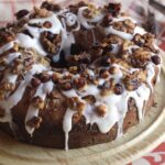 Nutty Brown Sugar Bundt Cake with Almond Glaze Topped with Caramelized Nuts