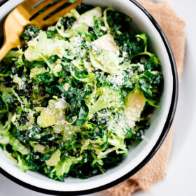 Shaved Broccoli, Brussels Sprouts, and Kale Salad with Truffle Parmesan Dressing
