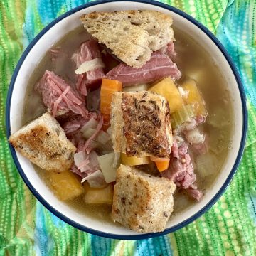 Corned Beef Vegetable Soup with Rye Skillet Croutons