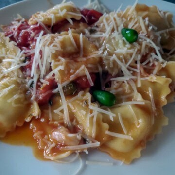 Ravioli tossed in Homemade Tomato Sauce